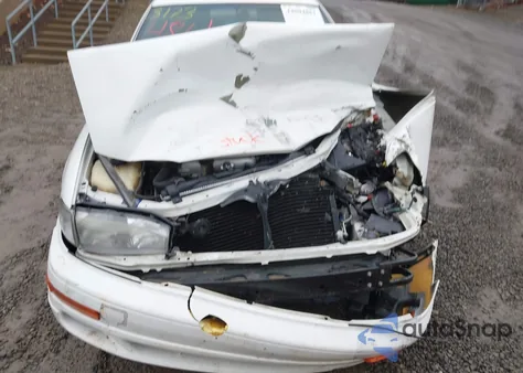 1993 Toyota Camry Le z USA, uszkodzony, nr VIN 4T1VK12W0PU053173